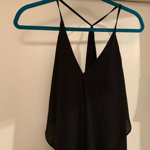 Black thin strapped, open back dress.